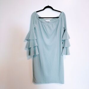 Janette Plus light blue off the shoulder bodycon dress with long sleeves. Ruffle
